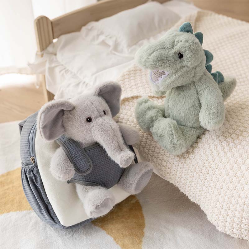 طقم دميتين – حقيبة ظهر الفيل & دمية الديناصور القطيفة